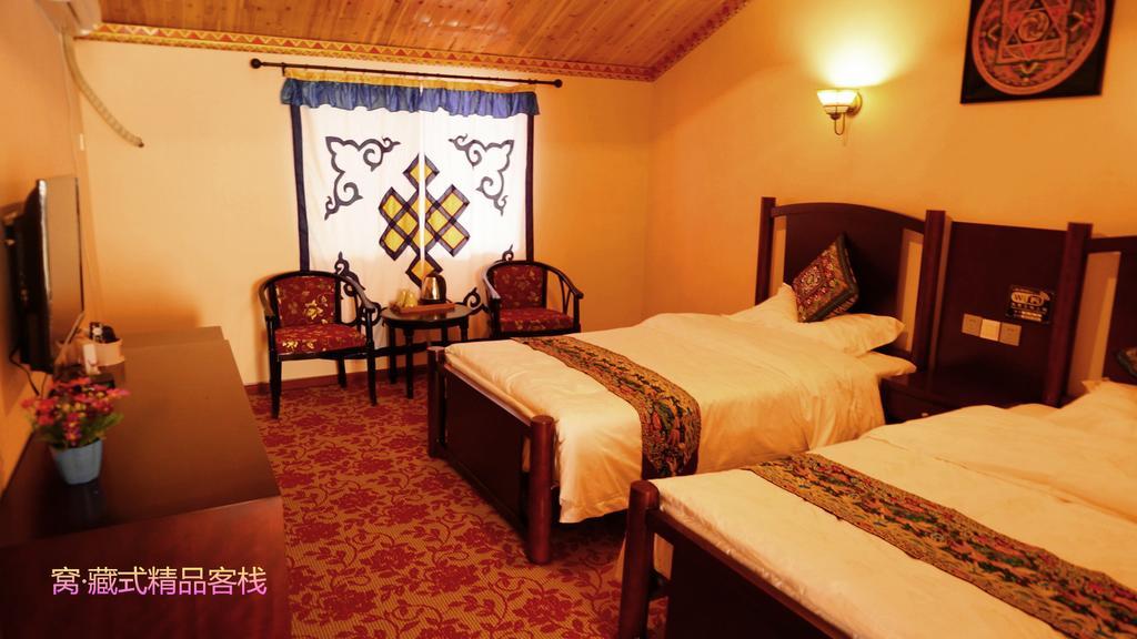 Wo Home Hostel Цзючжайгоу Номер фото