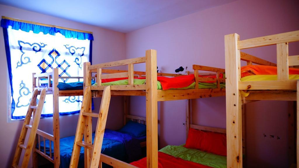 Wo Home Hostel Цзючжайгоу Номер фото