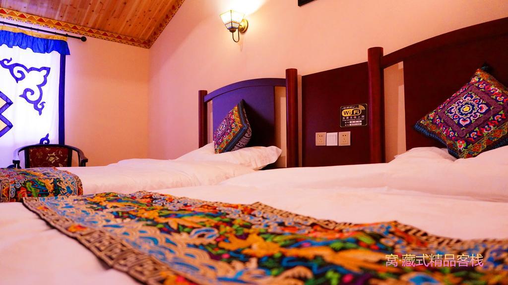 Wo Home Hostel Цзючжайгоу Номер фото