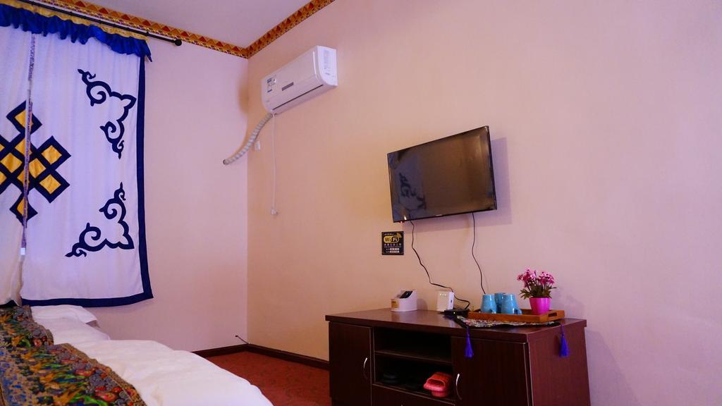 Wo Home Hostel Цзючжайгоу Номер фото