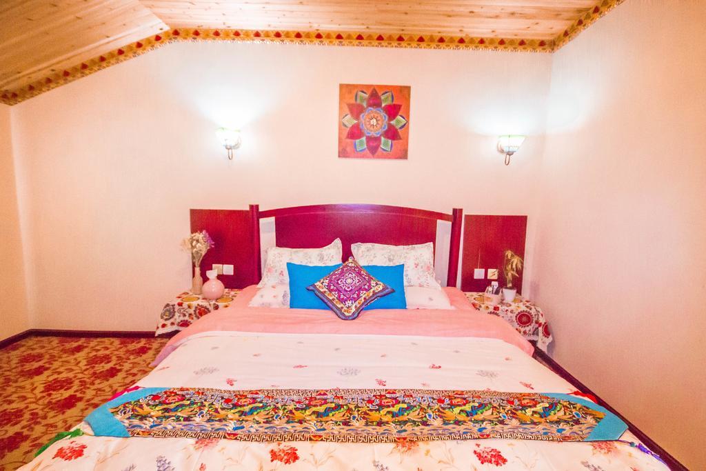 Wo Home Hostel Цзючжайгоу Экстерьер фото