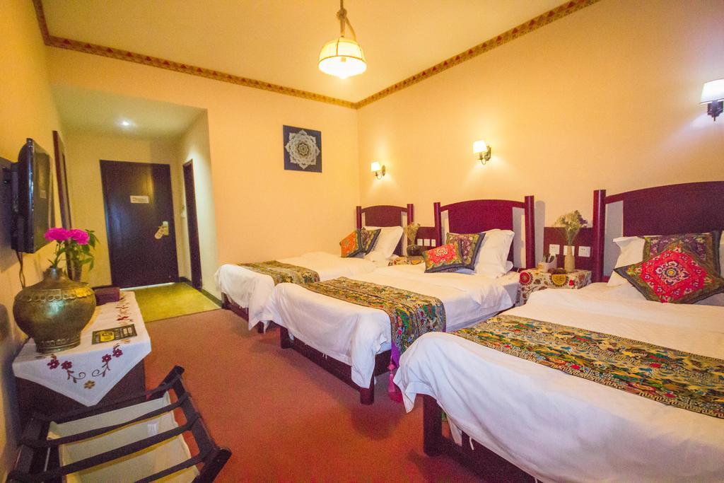 Wo Home Hostel Цзючжайгоу Экстерьер фото