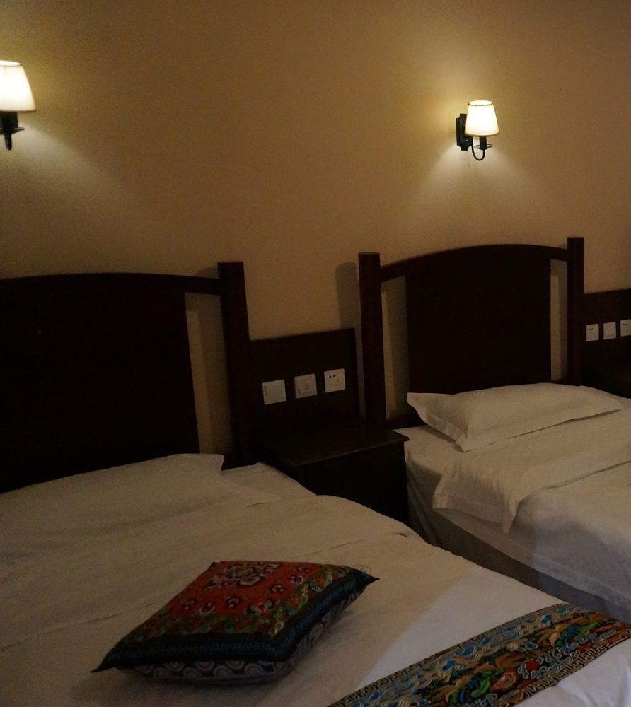 Wo Home Hostel Цзючжайгоу Экстерьер фото