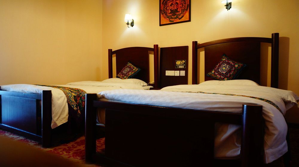 Wo Home Hostel Цзючжайгоу Экстерьер фото