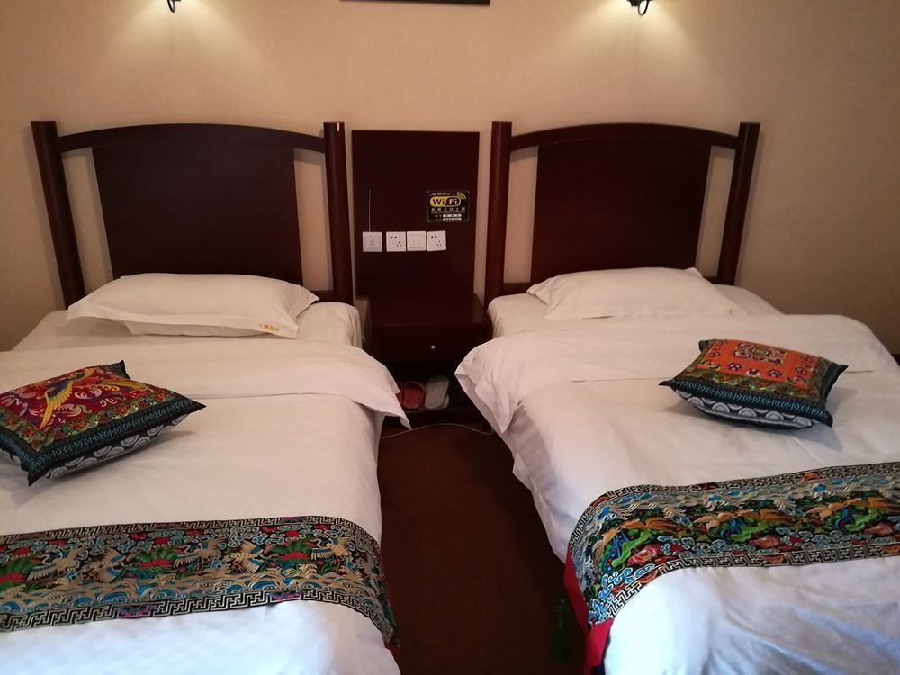 Wo Home Hostel Цзючжайгоу Экстерьер фото