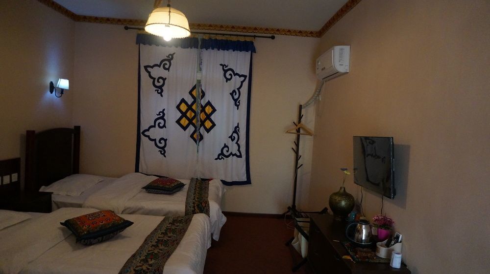 Wo Home Hostel Цзючжайгоу Экстерьер фото
