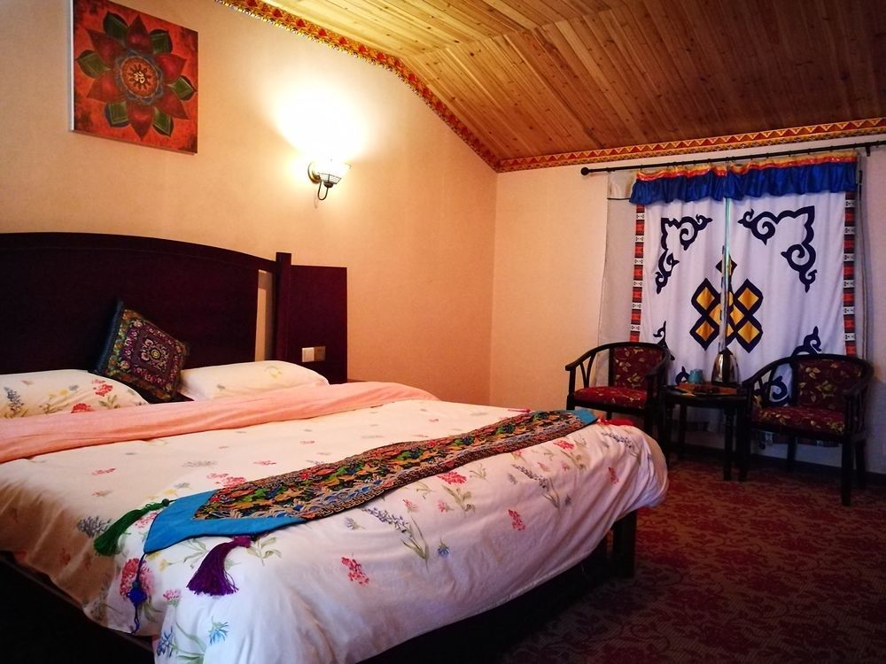 Wo Home Hostel Цзючжайгоу Экстерьер фото
