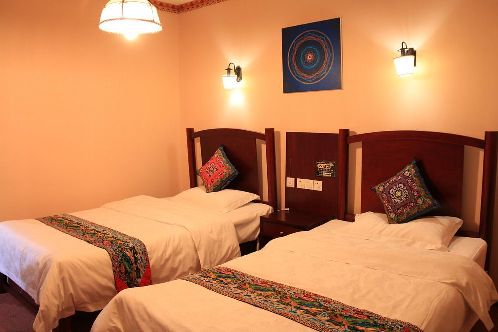 Wo Home Hostel Цзючжайгоу Экстерьер фото